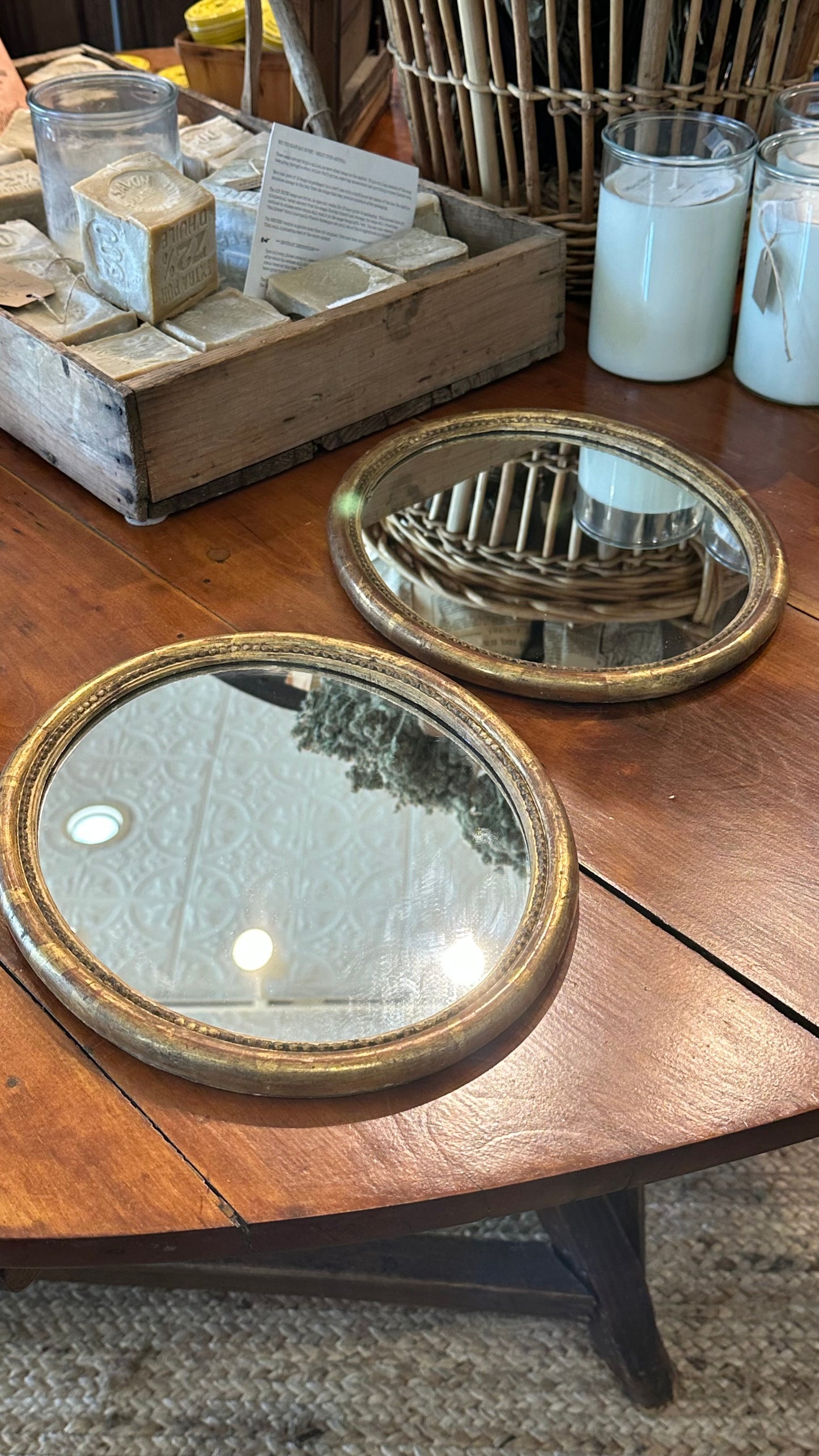Small 18th C gilded oval mirrors- new glass