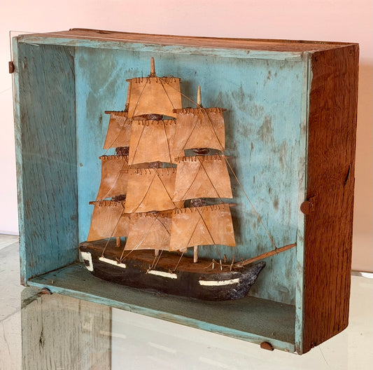 Primitive Model Ship in Shadow Box